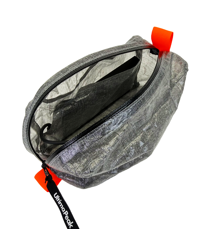 Open AeroStash Dyneema ditty bag showing the internal magnetic pocket