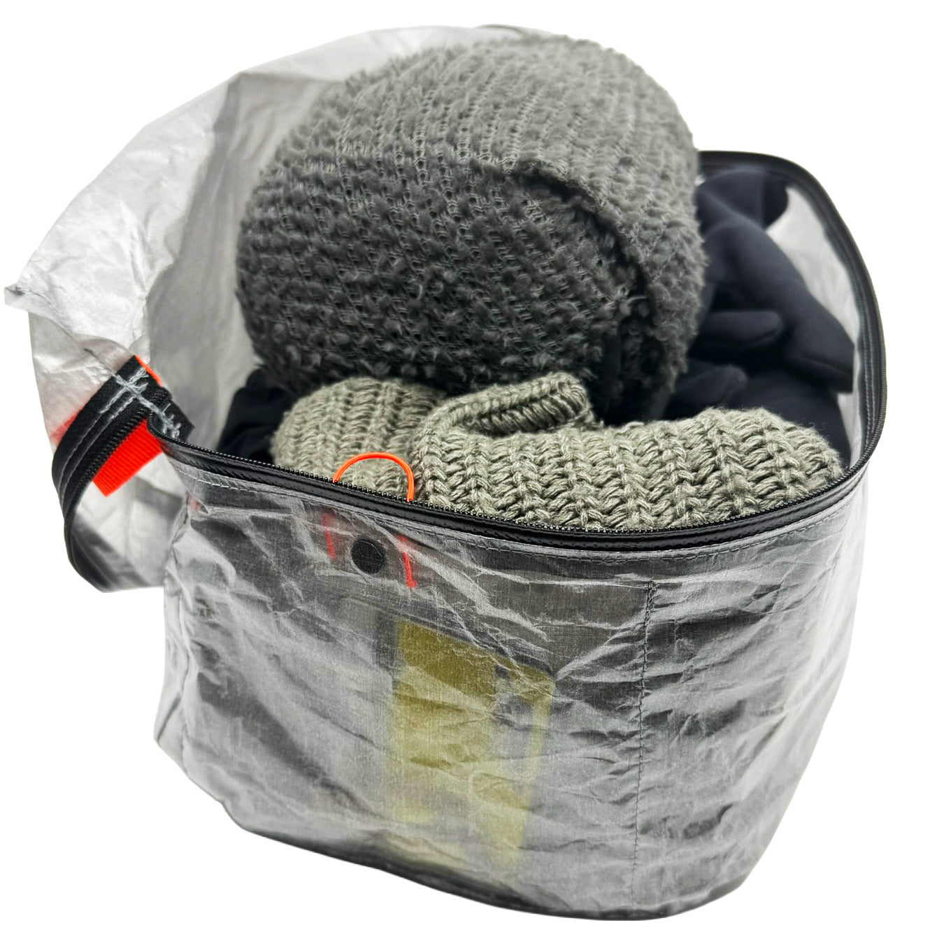 Open AeroCube Dyneema packing cube filled with hiking clothing