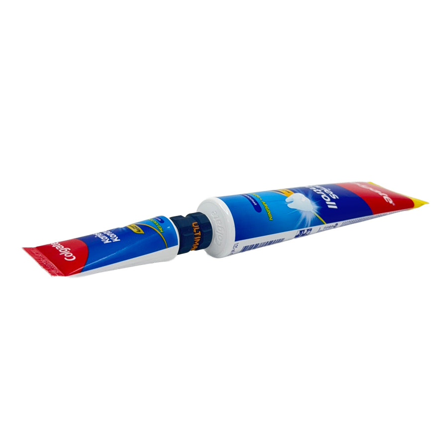 PastePort connecting a large toothpaste tube to a travel-size tube