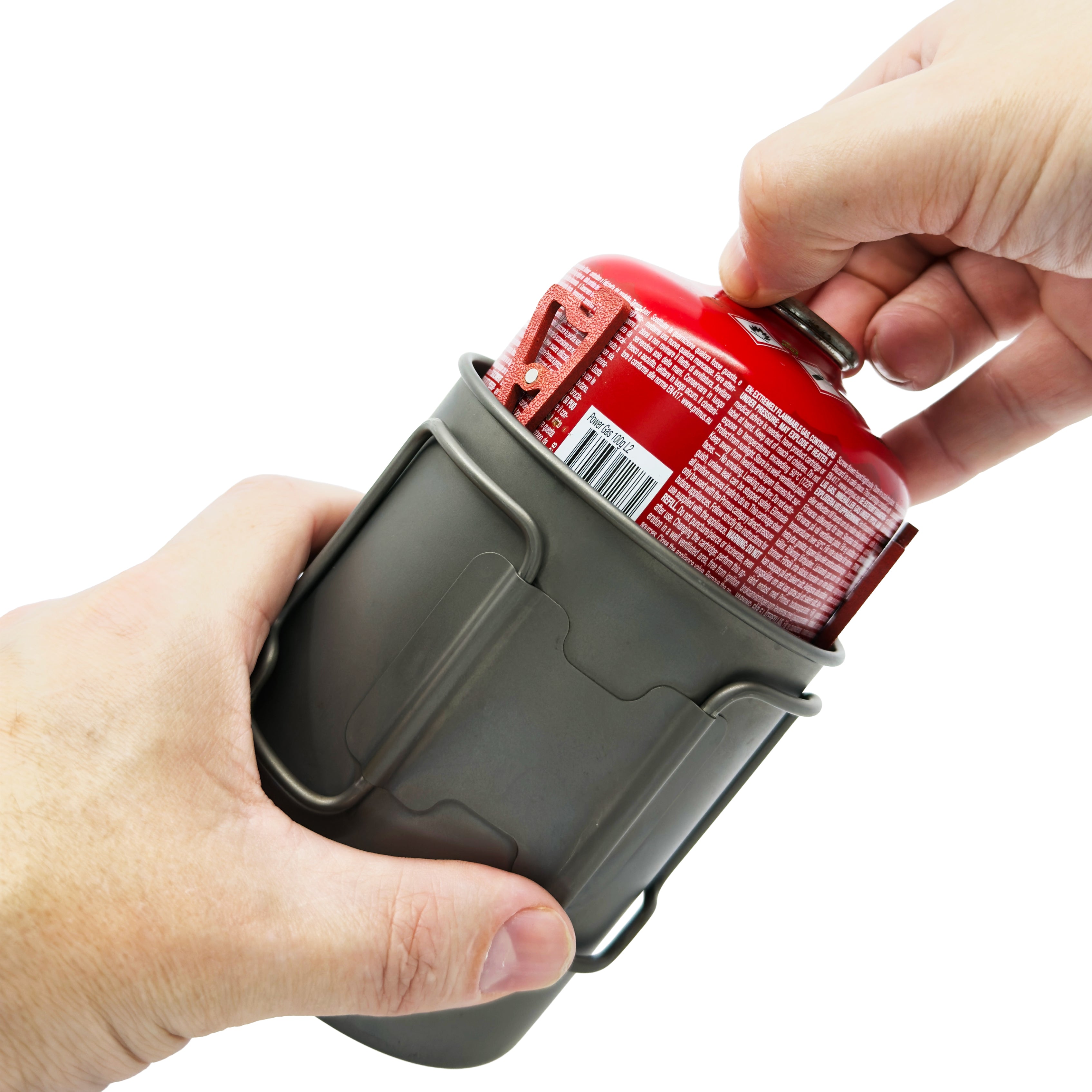 Removing a gas canister with MagFeets from a backpacking pot