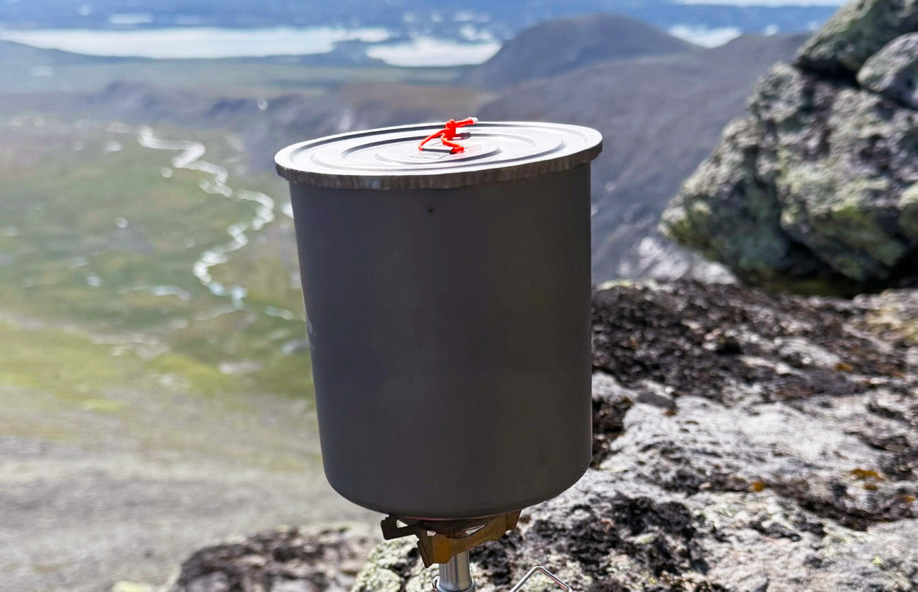 FeatherLid titanium lid with compatible TOAKS backpacking pot