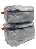 Three AeroCube ultralight Dyneema packing cubes stacked together