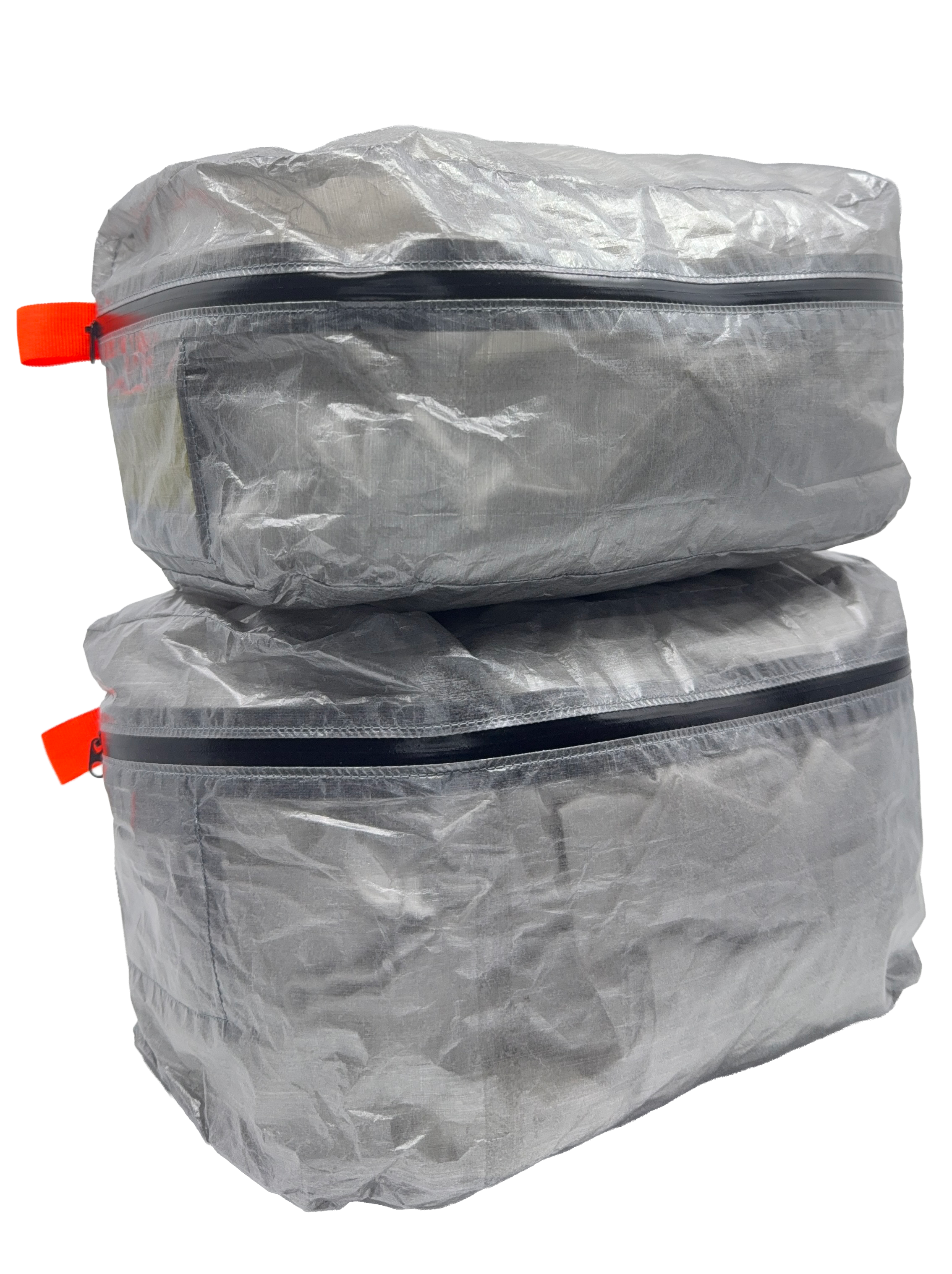 Three AeroCube ultralight Dyneema packing cubes stacked together