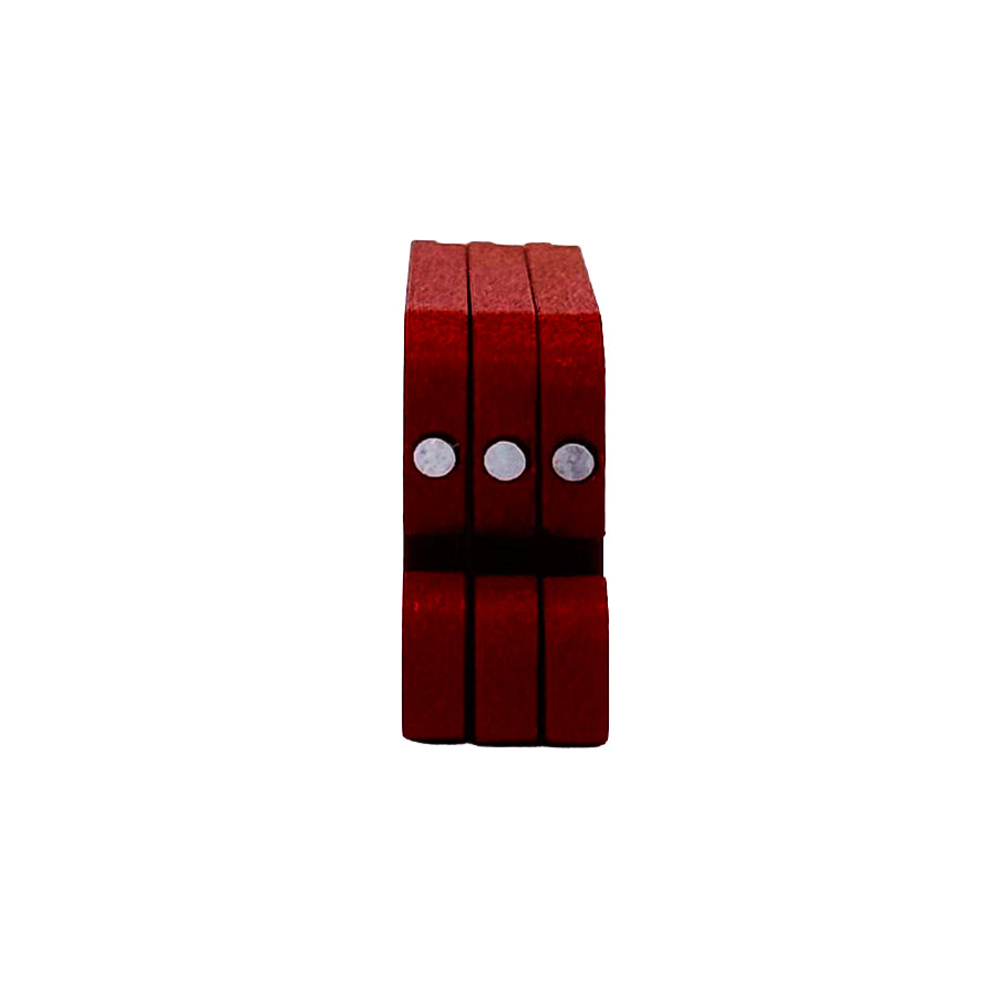 Three red MagFeets feet stacked together