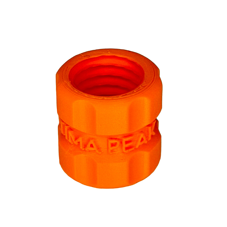 Orange PastePort refill adapter, close-up view