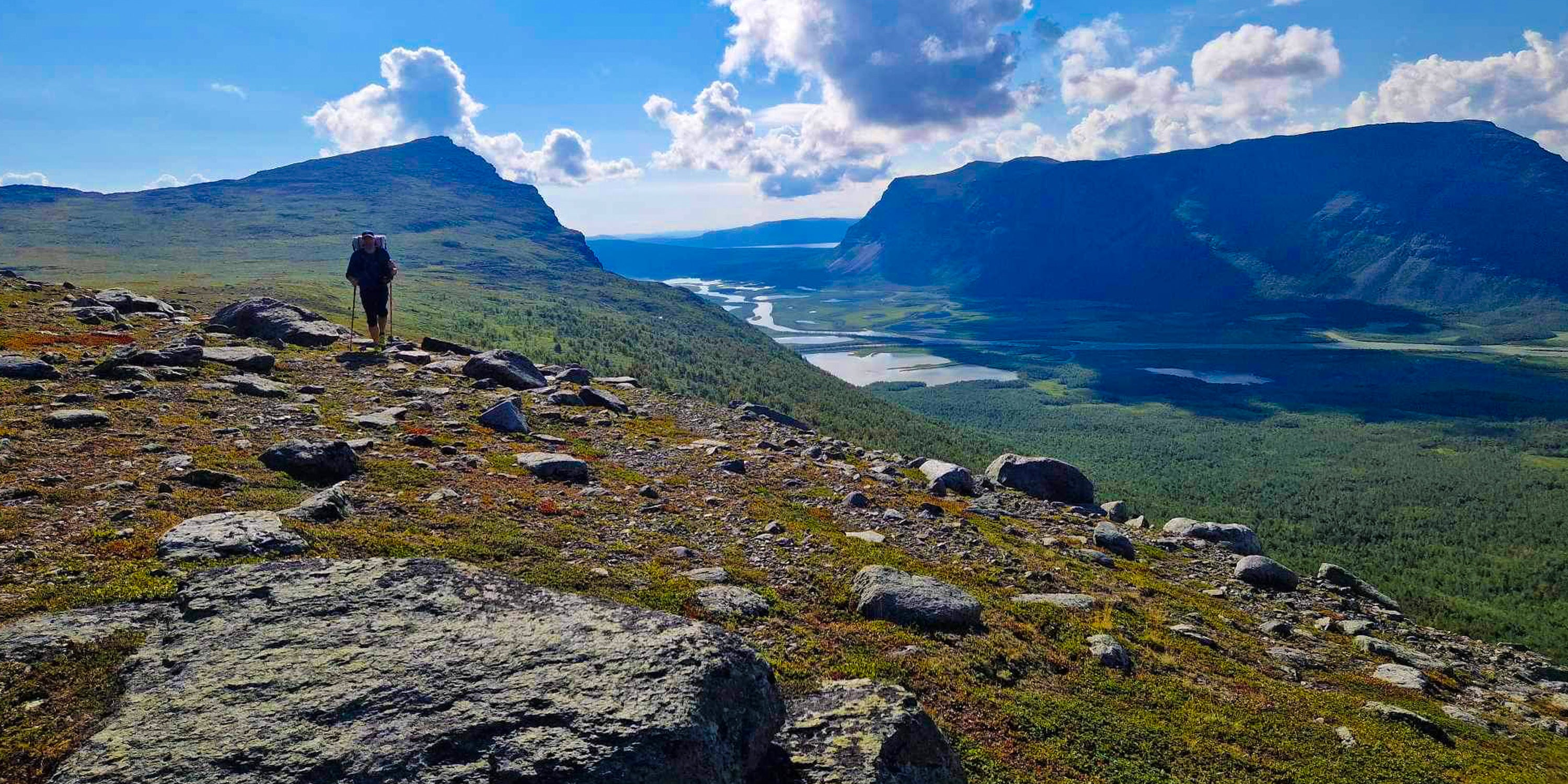 Hiker in a northern Swedish mountain landscape